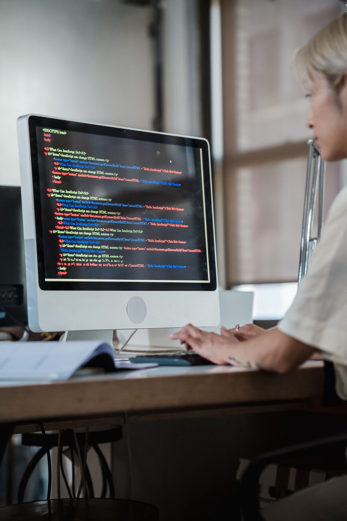 Developer working on code at a desk